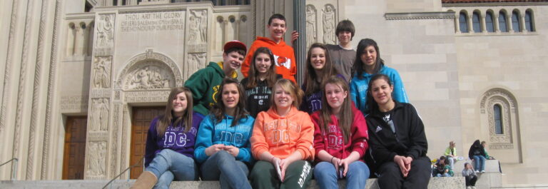 Students sitting on basilica steps